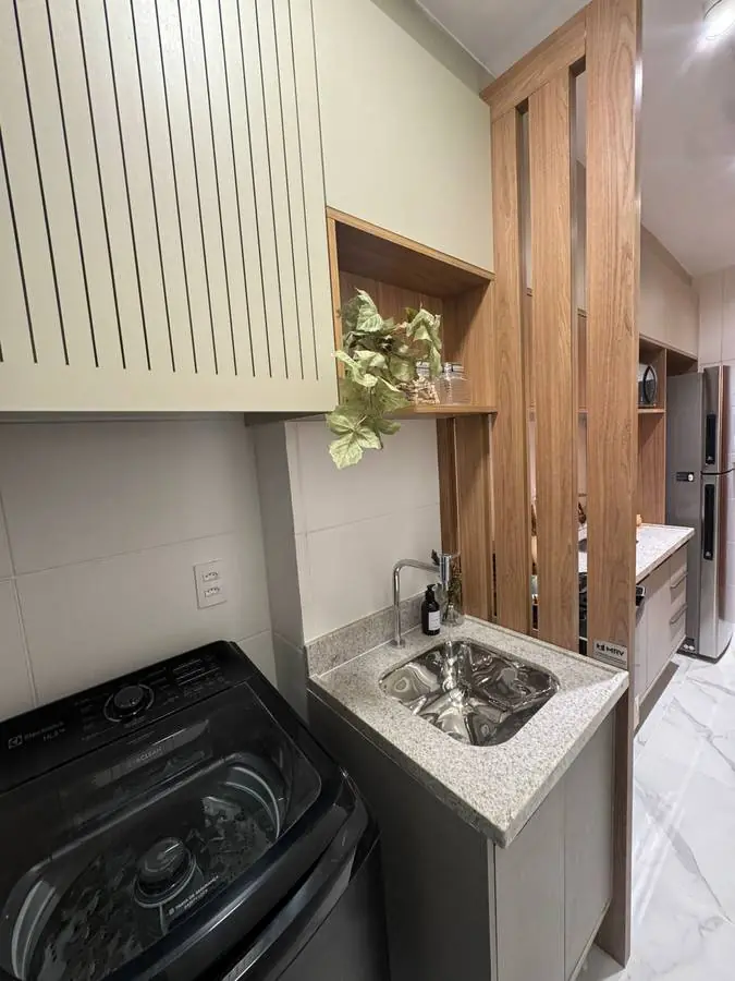 Foto da área de serviço do apartamento decorado do Caminho dos Jerivás